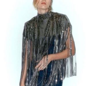 Absolutely Stunning Sequined Cape.
NWT